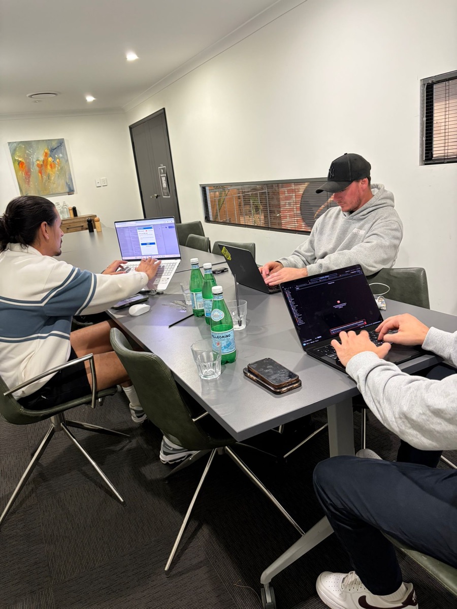 Founders working on laptops at The Forge
