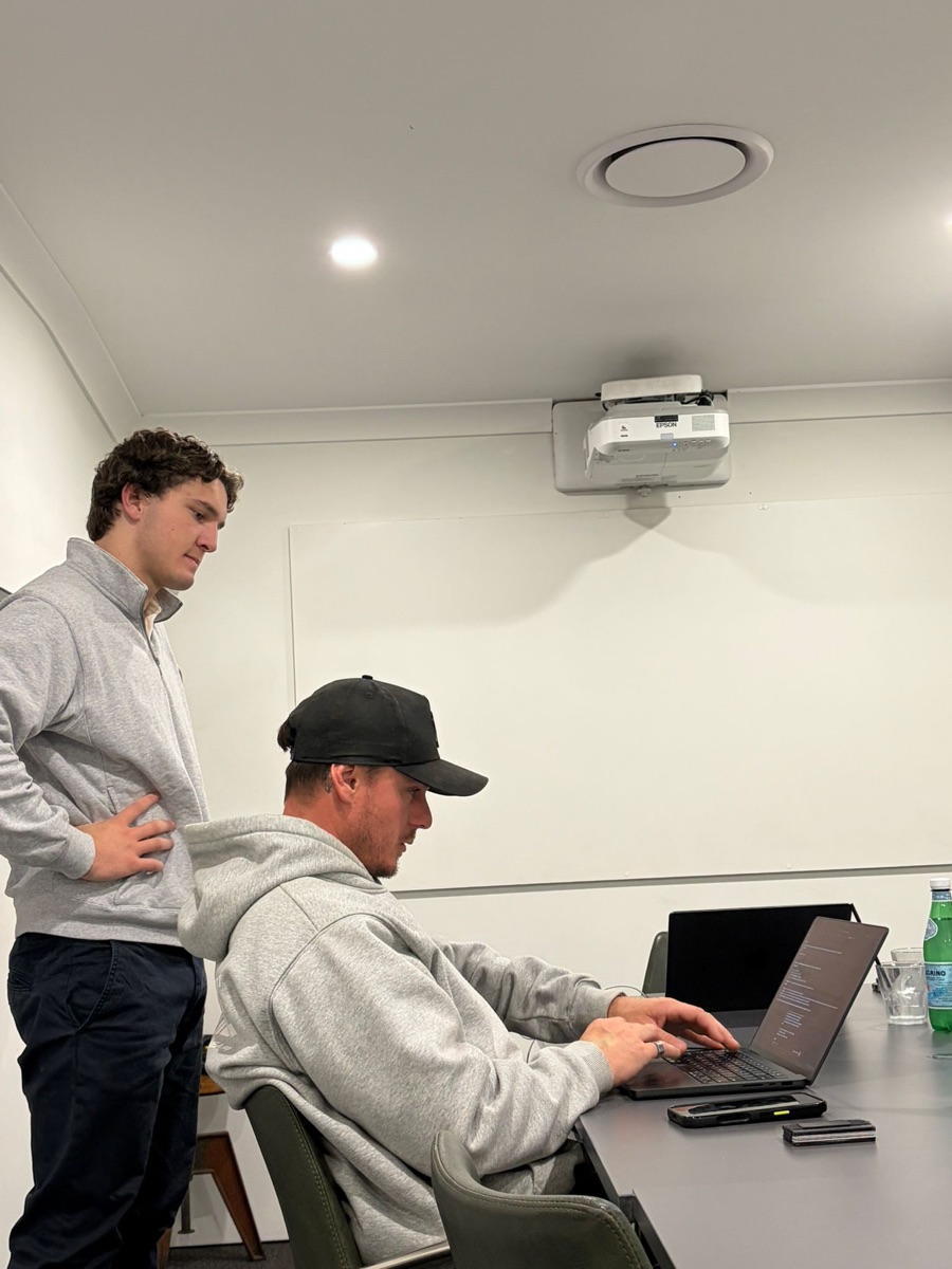 Sam helping an attendee at The Forge